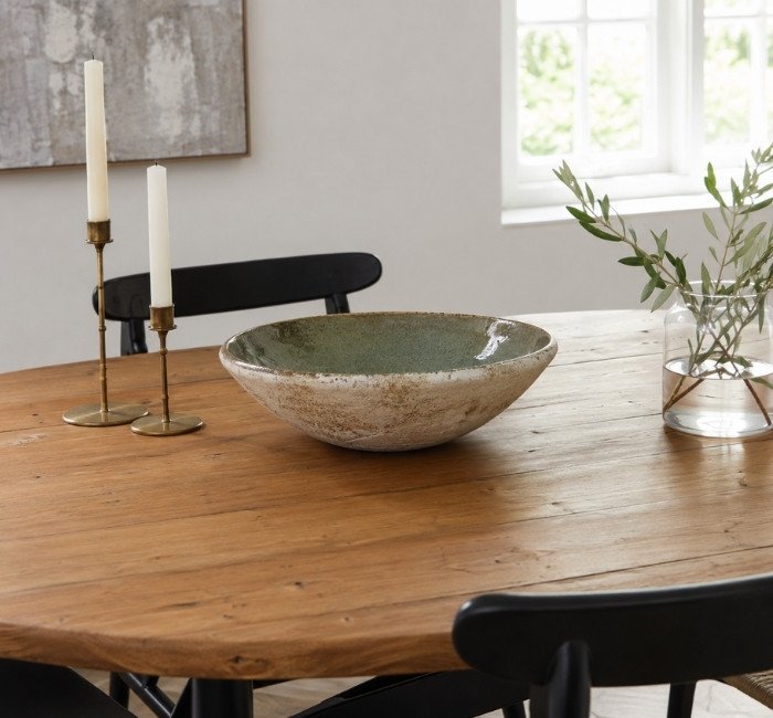 Decorative ceramic bowl used as a dining table centerpiece